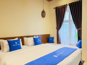 Suite, balcón, vista a la alberca | Escritorio y wifi gratis 