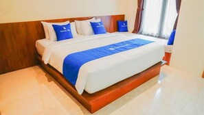 Suite, balcón, vista a la alberca | Escritorio y wifi gratis 