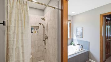 Shower, hair dryer, towels, shampoo