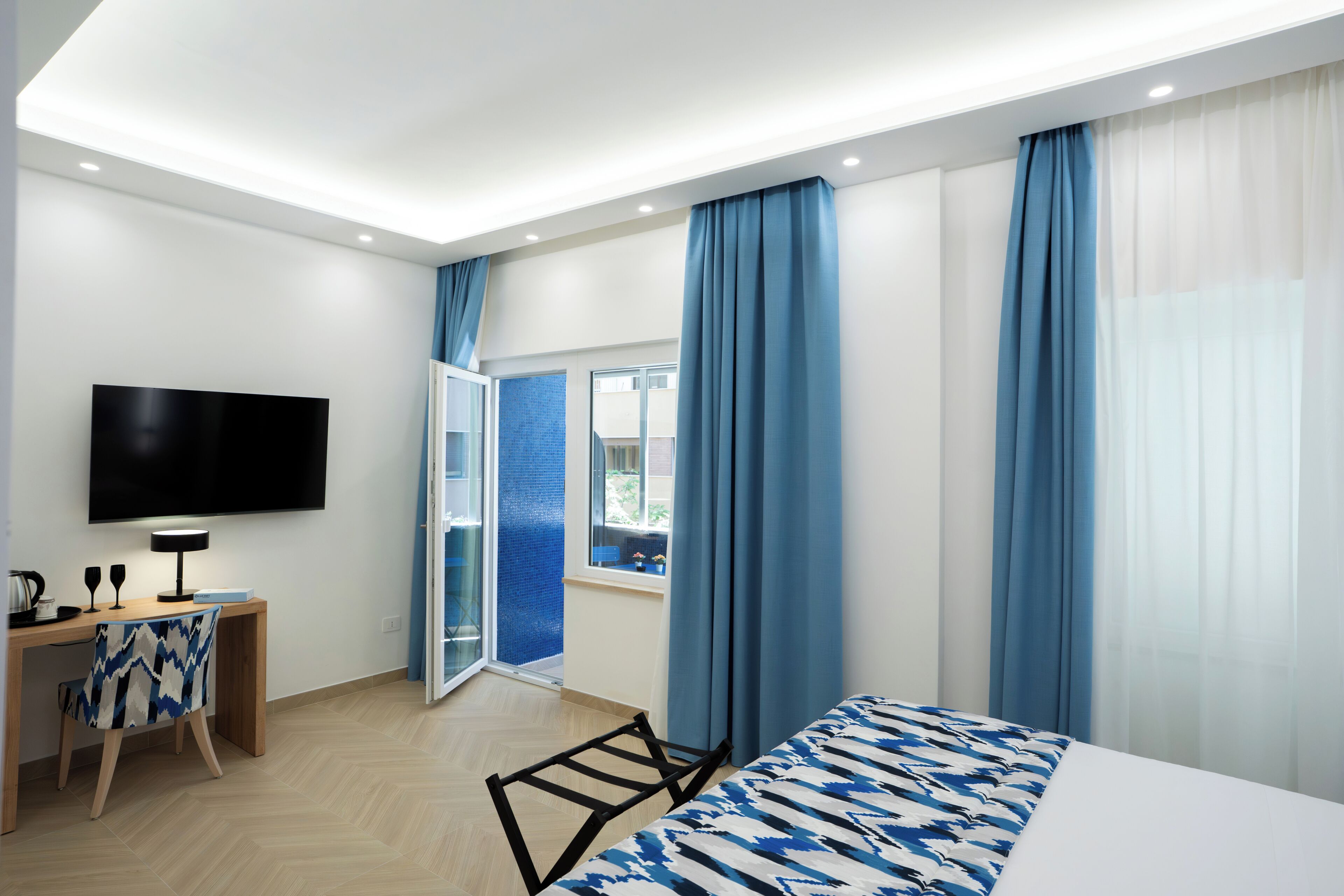 Chambre Triple Deluxe, 1 grand lit, balcon, vue ville | Draps en coton égyptien, literie de qualité supérieure