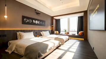 Premium bedding, down duvets, desk, laptop workspace