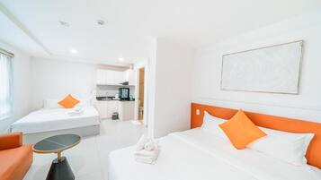 Deluxe Double or Twin Room, Balcony, City View | Free minibar items, in-room safe, soundproofing, iron/ironing board