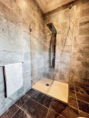 Deluxe Apartment, Balcony, City View | Bathroom | Combined shower/tub, hair dryer, towels, soap
