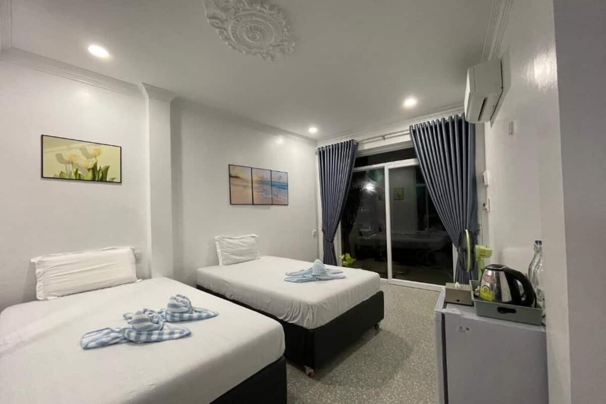 Phòng đôi hoặc 2 giường đơn Tiêu chuẩn, ban công, quang cảnh sân vườn | Khu vực làm việc phù hợp cho laptop 
