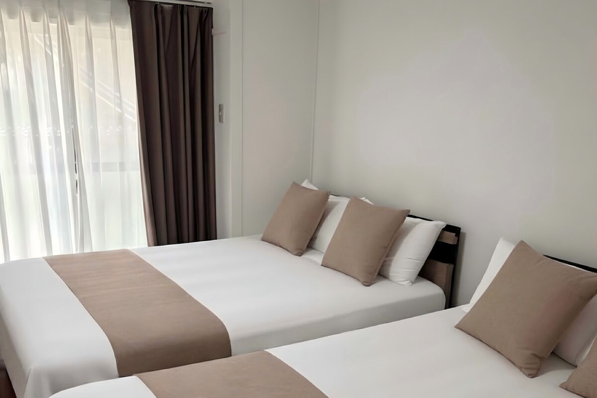 Superior Quadruple Room, Balcony, City View | Desk, laptop workspace, blackout curtains, soundproofing