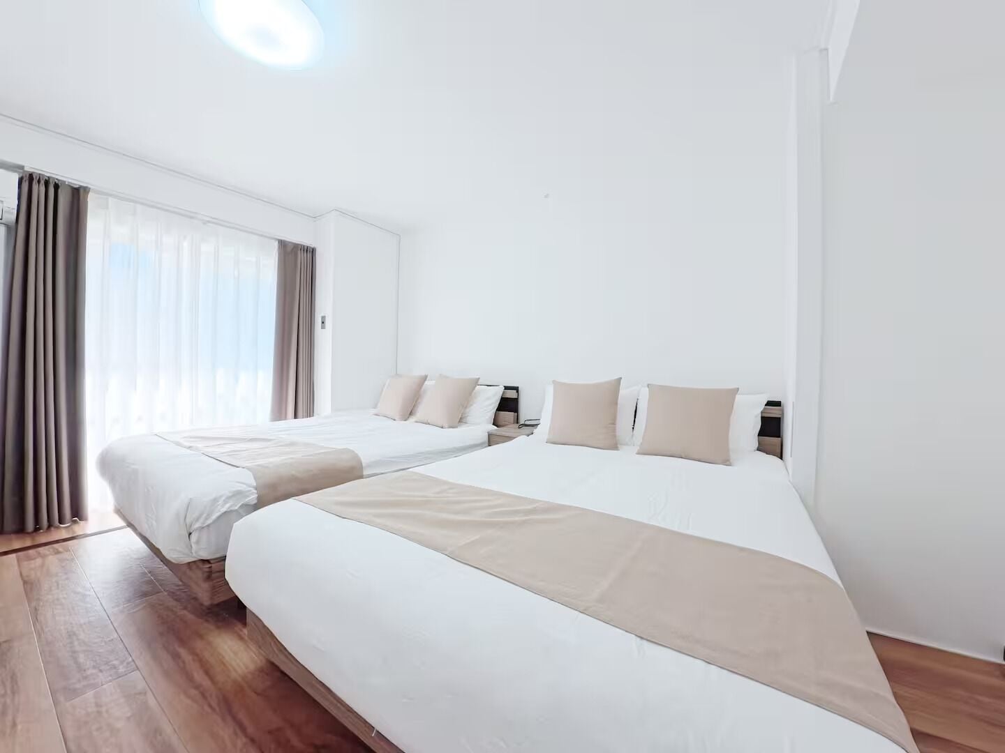 Comfort Quadruple Room, Balcony, City View | Desk, laptop workspace, blackout drapes, soundproofing
