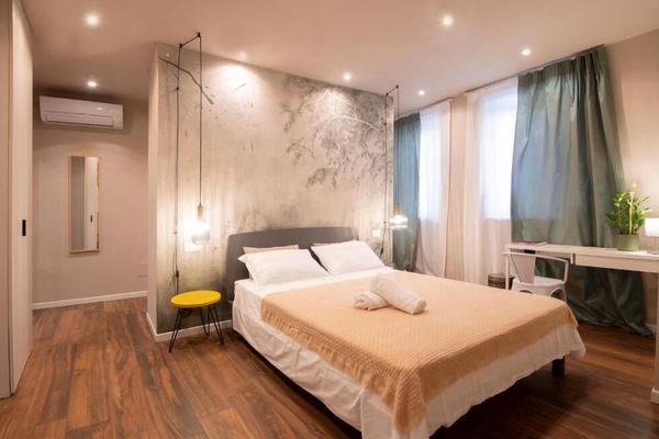 Junior Quadruple Room | Minibar, desk, laptop workspace, blackout drapes