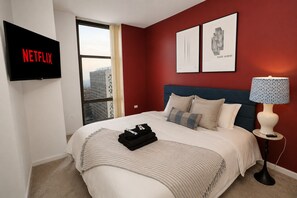2 habitaciones, tabla de planchar con plancha y cuna de viaje 
