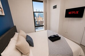 2 habitaciones, tabla de planchar con plancha y cuna de viaje 