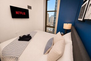 2 habitaciones, tabla de planchar con plancha y cuna de viaje 