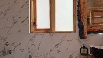 Shower, jetted tub, hair dryer, towels