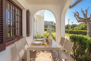 Outdoor dining - Apartment with pool at Son Bou beach, Menorca (Sant Jaume)