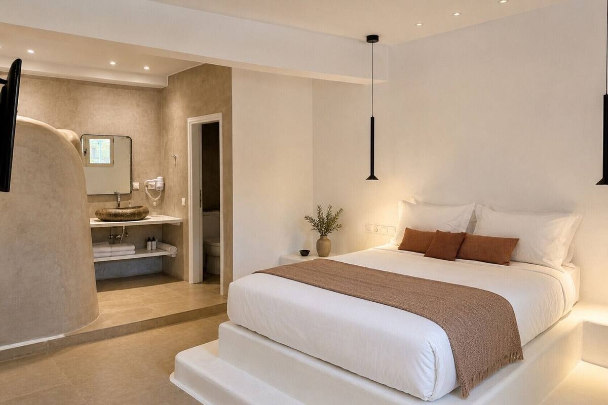 Suite estudio superior, balcón, vista a la montaña | Artículos del minibar gratis y caja de seguridad en la habitación
