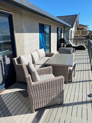 Outdoor dining - Picturesque Beachfront Retreat with 5 Bedrooms! (The Entrance North)