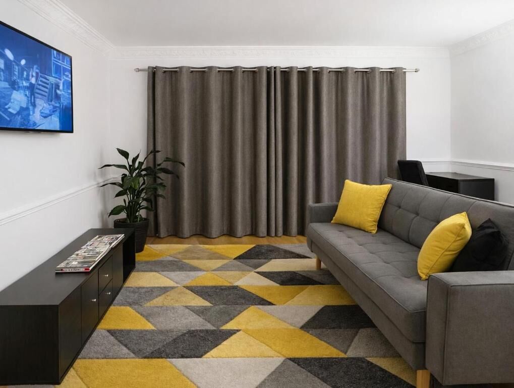 Deluxe Studio, Garden View | Living area
