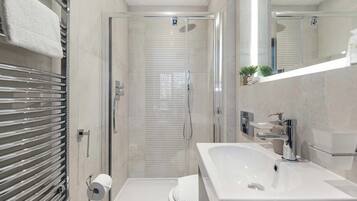 Shower, hair dryer, shampoo