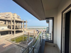 Deluxe Room, Balcony, Partial Sea View | View from room