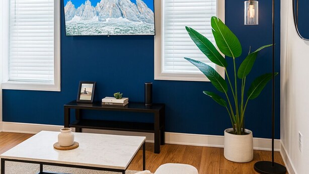 Living area - Unwind in this well-maintained unit with free parking, a fully stocked kitchen, and an in-suite washer/dryer. Perfect for work or leisure travel, this comfortable space has everything you need for a relaxing stay. (Rochester)
