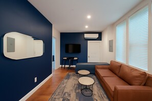 Living area - Modern 1BD/1BA apartment in the heart of Cornhill featuring high-speed WiFi, smart TV, and a fully equipped kitchen. Perfect blend of comfort and convenience in one of Rochester’s most charming neighborhoods. (Rochester)