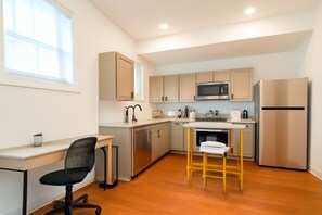 Private kitchen - Modern 1BD/1BA apartment in the heart of Cornhill featuring high-speed WiFi, smart TV, and a fully equipped kitchen. Perfect blend of comfort and convenience in one of Rochester’s most charming neighborhoods. (Rochester)