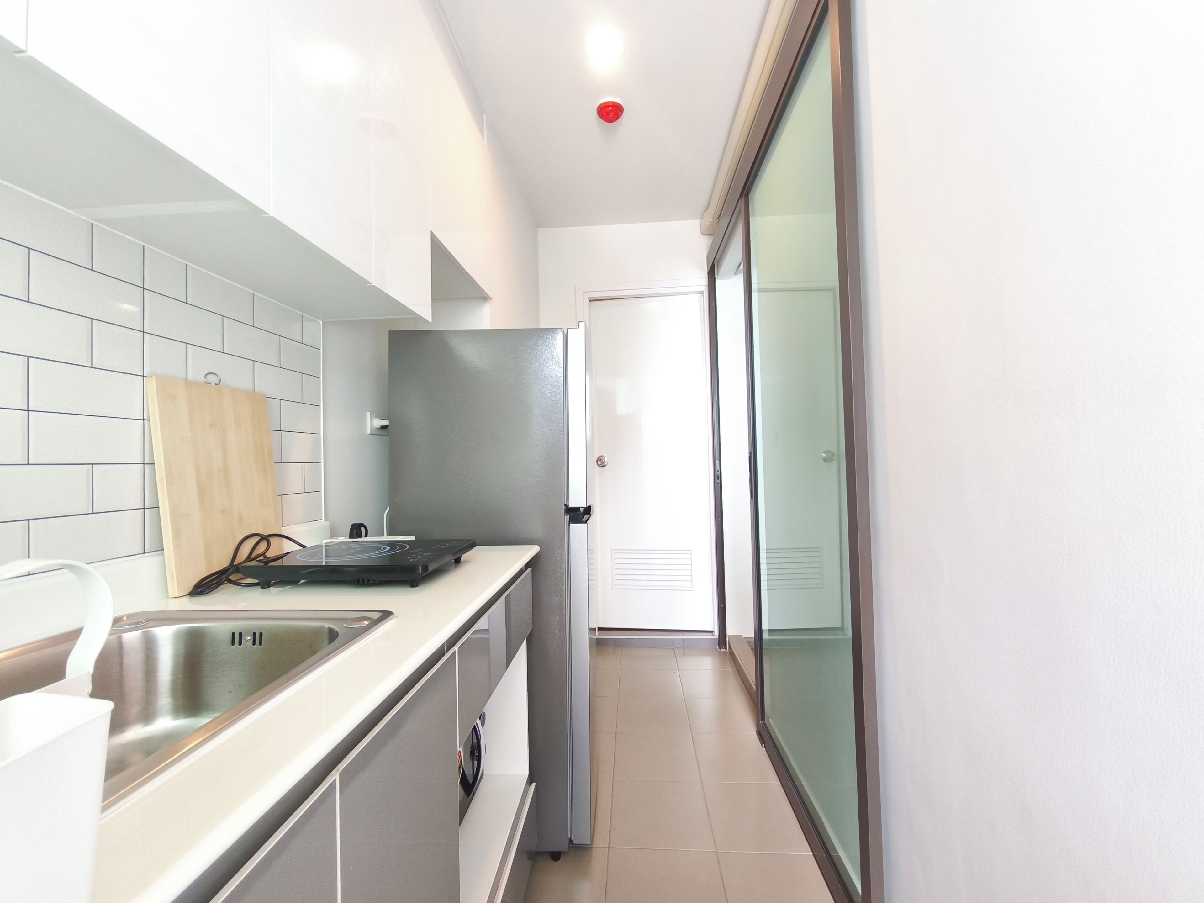 Fridge, microwave, electric kettle, cookware/dishes/utensils