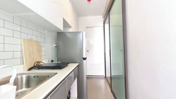 Fridge, microwave, electric kettle, cookware/dishes/utensils