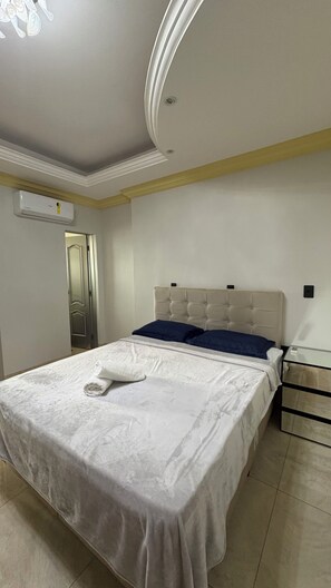 Deluxe Apartment, Air conditioning, City View | Blackout drapes, iron/ironing board