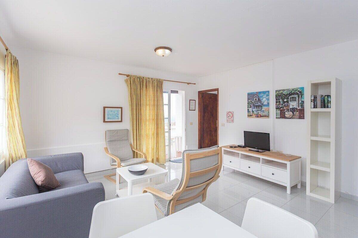 Apartment (One-Bedroom Apartment with Terrace) | Iron/ironing board, WiFi (free), bed sheets