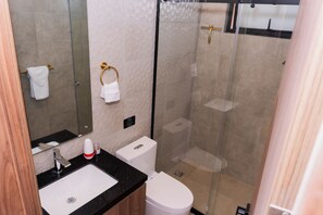 Shower, hair dryer, towels, soap