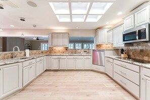 Fridge, microwave, oven, stovetop - Indian Rocks Escape Luxury Beach Villa Pickleball, Pool & Game Room (Largo)
