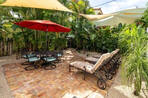 Outdoor dining - Coco Plum Cottage a Charming Retreat Htd Pool and BBQ (West Palm Beach)