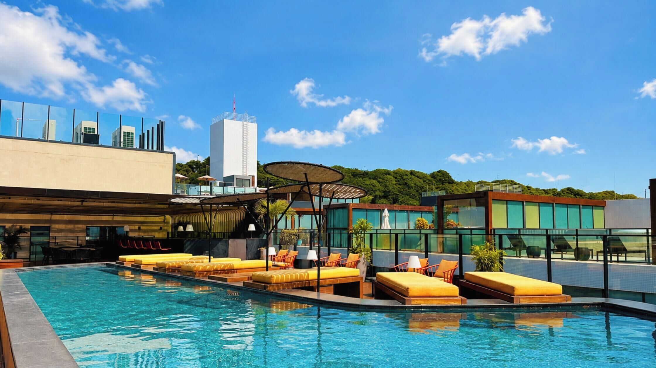 Outdoor pool, open 6:00 AM to 10:00 PM, pool umbrellas, pool loungers