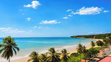 On the beach, white sand, beach umbrellas