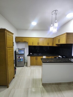 Private kitchen -  5-Min POP Airport & Beach Retreat | Modern 2BR (Puerto plata)
