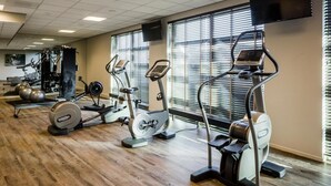 A gym with cardio machines, weight equipment, and exercise balls. - Experience Comfort and Wellness! Indoor Pool, Near Beeradvertising Museum! (Etten-Leur)