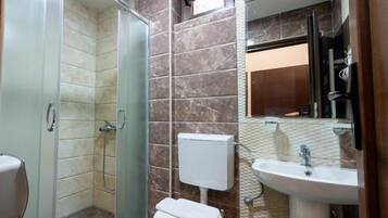 Shower, free toiletries, hair dryer, towels