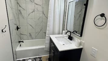 Hair dryer, towels, soap, shampoo