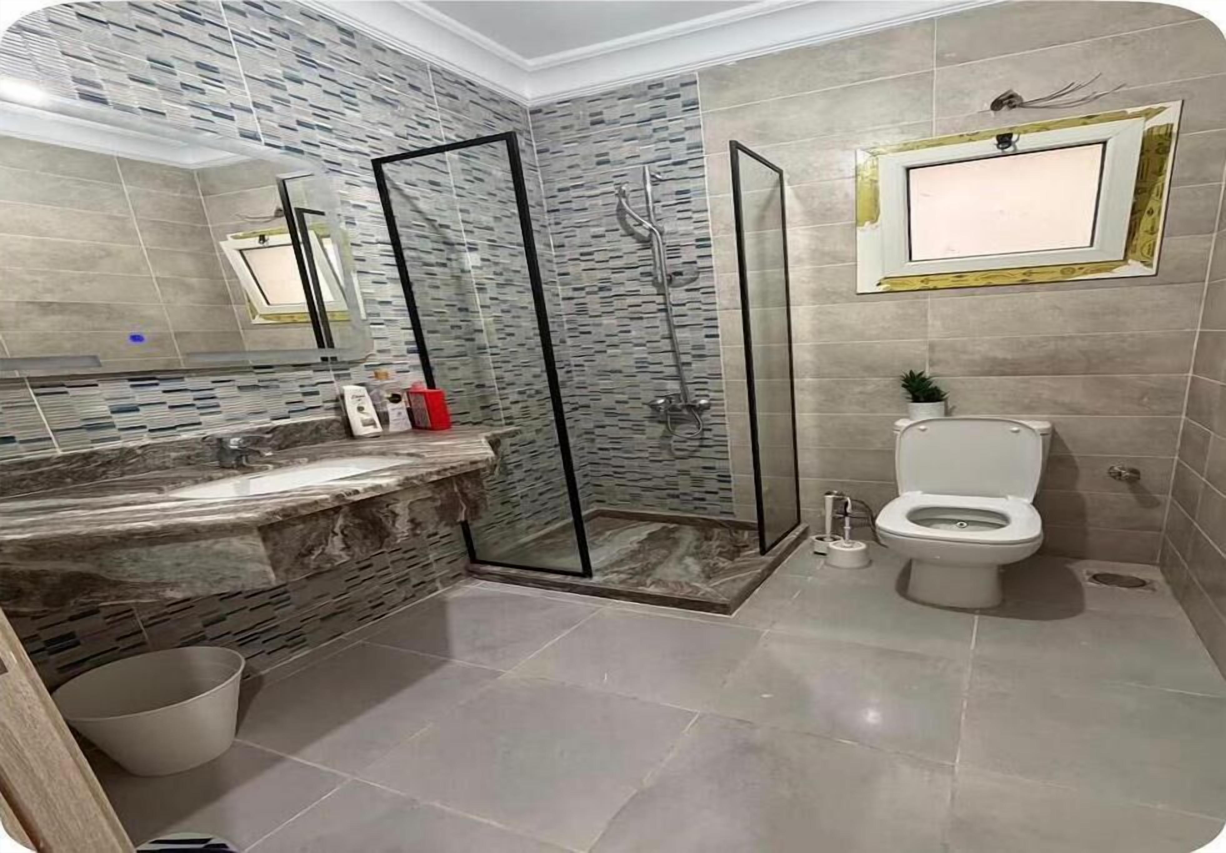 Shower, bidet, towels, soap