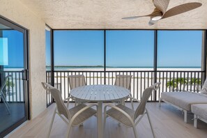 Outdoor dining - Carlos Pointe #126 - Endless Beach | Gulf-Front, Pool + Stunning Sunsets 🌅 (Fort Myers Beach)