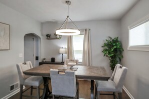 Dining - 4BR Newly Remodeled · Steps to VA Hospital · Garage · Sunroom · Sleeps 7 (Omaha)