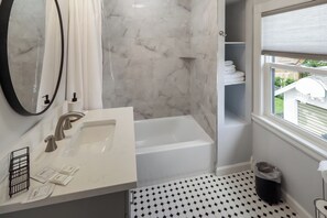 Shower, hair dryer, towels, soap - 4BR Newly Remodeled · Steps to VA Hospital · Garage · Sunroom · Sleeps 7 (Omaha)