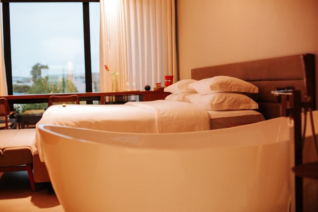 Luxury Suite, City View | Desk, laptop workspace, soundproofing, iron/ironing board