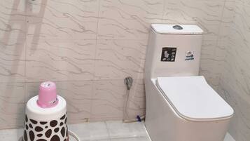 Shower, free toiletries, towels, soap