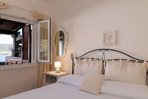 Apartment, 2 Bedrooms, Sea View | Iron/ironing board, free WiFi - Casa Matilde con Patio by Wonderful Italy (Marinella)
