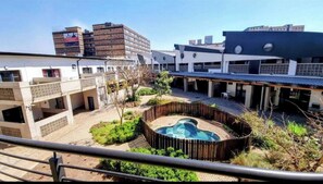 Room, 1 Bedroom, Balcony | Pool | Outdoor pool - Room-diamonds Apartment 212 (Johannesburg)