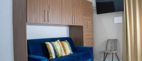 Chambre Deluxe double, balcon, vue sur le jardin | Aire de séjour
