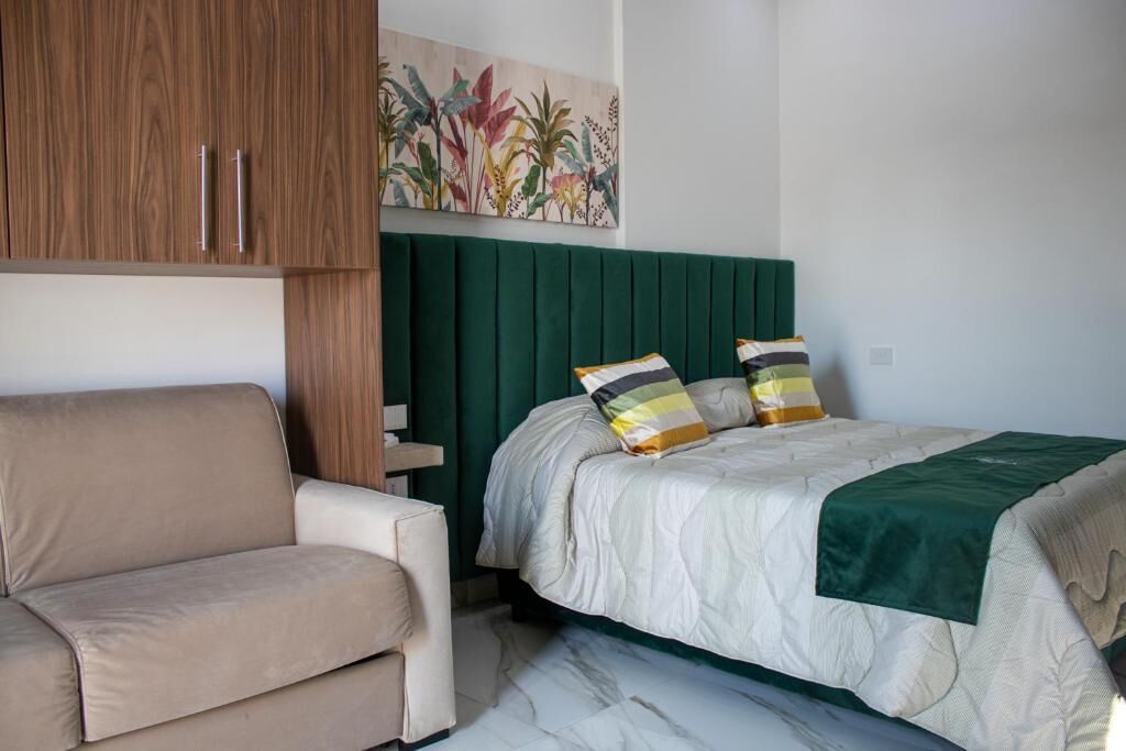 Doppelzimmer, Balkon, Gartenblick | Zimmersafe, Bügeleisen/Bügelbrett, kostenloses WLAN