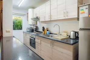 Fridge, microwave, stovetop, toaster - Hermoso Departamento 3D a pasos de Centro de Pucón (Pucon)