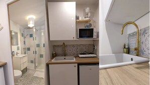 A bathroom with a shower, toilet, and sink; a kitchen with a microwave, sink, and a small refrigerator; and a separate bathroom with a bathtub and sink.