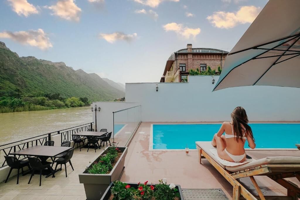 Seasonal outdoor pool, open 9:00 AM to 8:00 PM, free pool cabanas